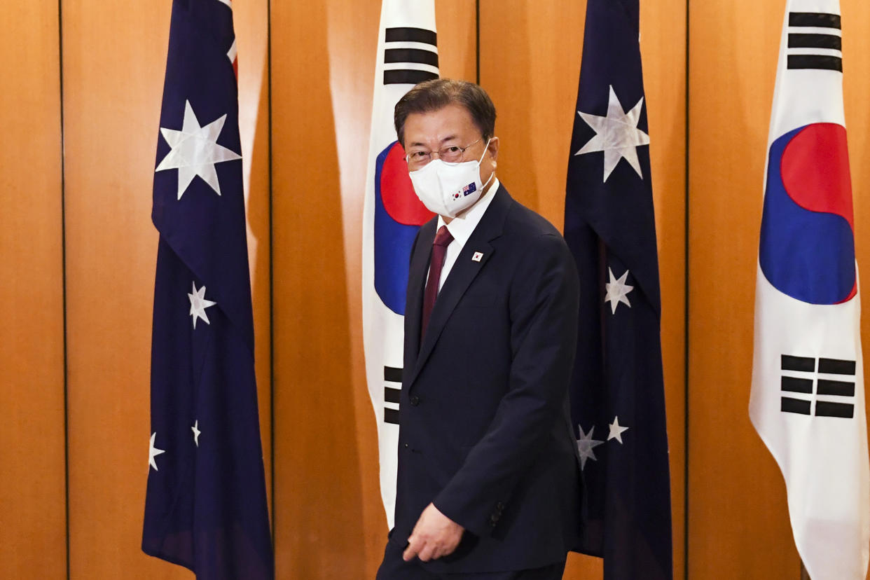 South Korean President Moon Jae-in arrives for a bilateral meeting with Australian Prime Minister Scott Morrison at Parliament House, in Canberra, Australia, Monday, Dec. 13, 2021. Moon is on a two-day official visit to Australia. (Lukas Coch/Pool Photo via AP)