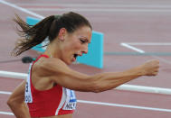 Bulgaria's Ivet Lalova celebrates after winning the women's 100m final at the 2012 European Athletics Championships at the Olympic Stadium in Helsinki on June 28, 2012. Bulgaria's Ivet Lalova won the race ahead of Ukraine's Olesya Povh and Lithuania's Lina Grincikaite. AFP PHOTO / YURI KADOBNOVYURI KADOBNOV/AFP/GettyImages