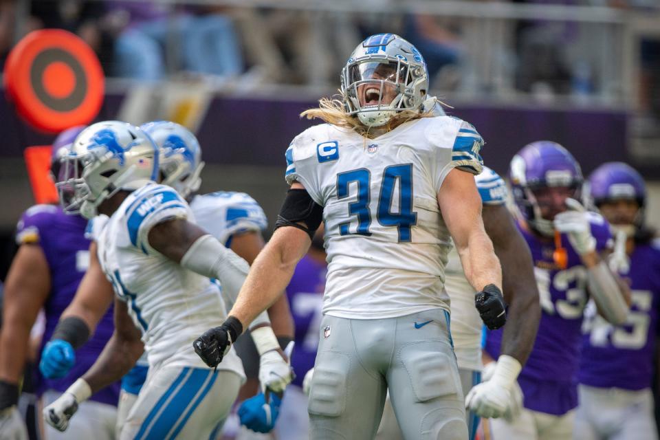 Detroit Lions linebacker Alex Anzalone celebrates during the second half against the Minnesota Vikings at U.S. Bank Stadium, Oct. 10, 2021 in Minneapolis.
