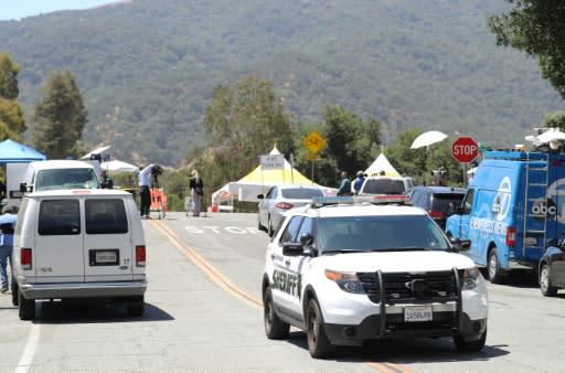 GILROY, CALIFORNIA - JULY 29: A police vehicle passes outside the site of the Gilroy Garlic Festival after a mass shooting took place at the event yesterday on July 29, 2019 in Gilroy, California