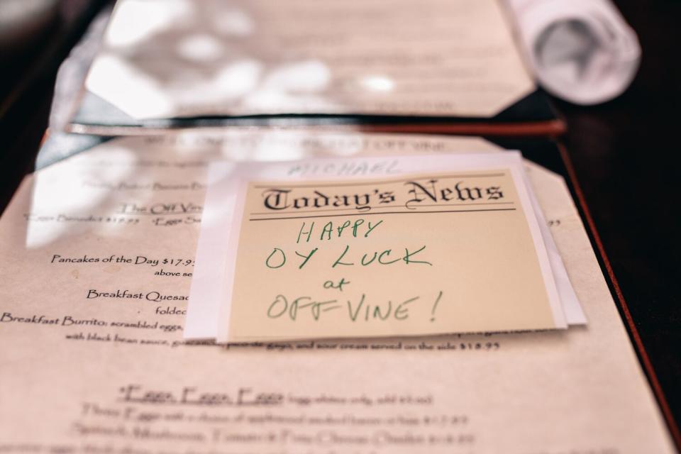 Placards and menus on a table.