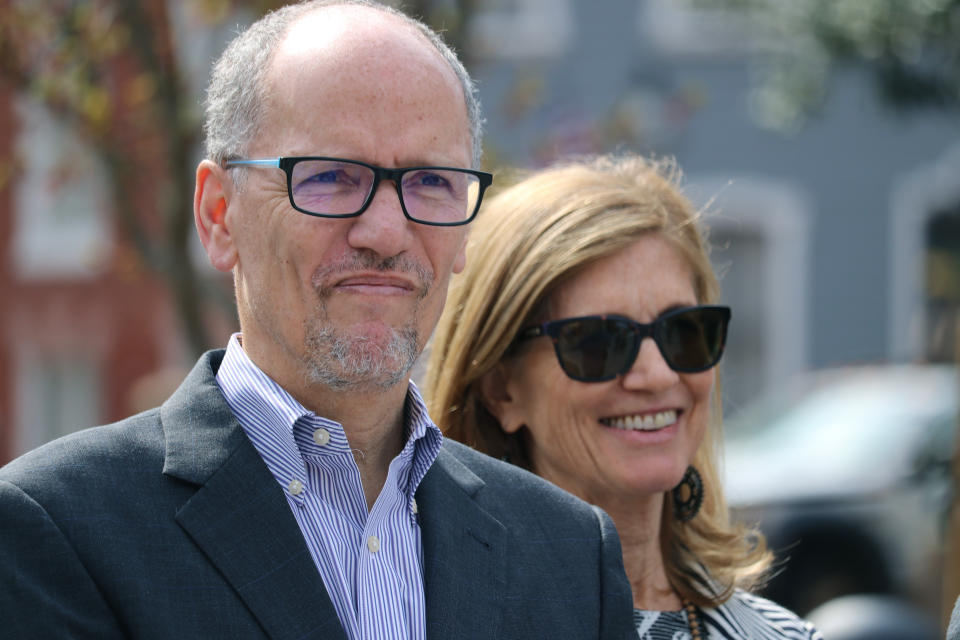 FILE - Former Labor Secretary Tom Perez, who is seeking the Democratic nomination for governor, stands with his wife, Ann Marie Staudenmaier, at an event where he outlined a blueprint for advancing women's rights at a news conference in Annapolis, Md., March 22, 2022. President Joe Biden has named Tom Perez, the former labor secretary and Democratic National Committee chairman, to be a senior adviser and his liaison to state and local governments as the White House turns its focus toward implementing Biden's infrastructure and climate legislation. (AP Photo/Brian Witte, File)