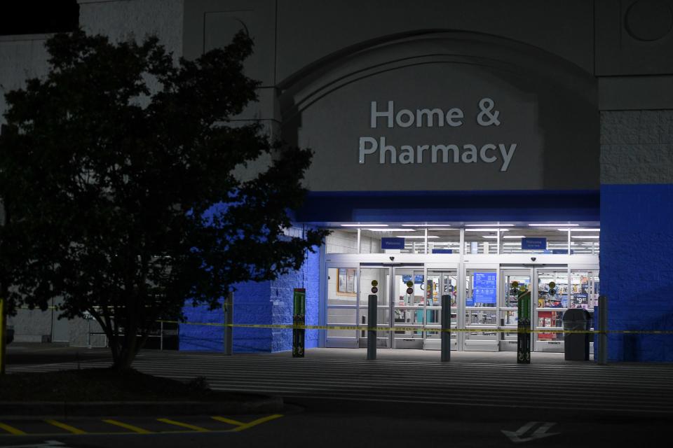 FILE - Police tape lines the front of the Walmart Supercenter off Whiskey Road in Aiken, S.C., on Wednesday, June 7, 2023. Police responded to shots fired at 7:34 p.m. at the Walmart. The alleged shooter is in custody.