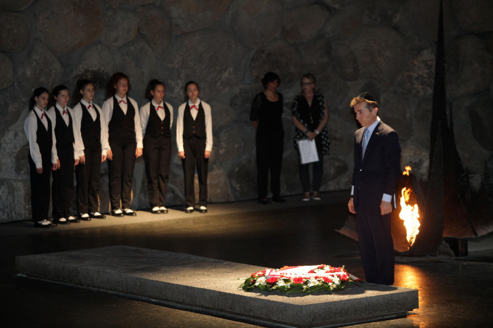 Georgian Prime Minister Bidzina Ivanishvili lays a wreath at the Hall of Remembrance at the Yad Vashem Holocaust memorial in Jerusalem, Monday, June, 24, 2013. (AP Photo/Dan Balilty)