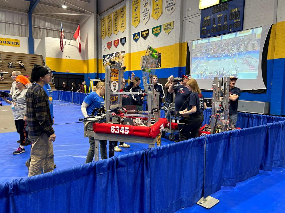 High school teams make their final preparations at the LSSU FIRST robotics competition on March 24, 2023.