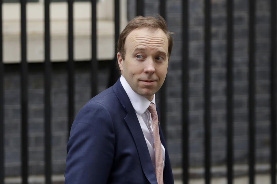 British Health Secretary Matt Hancock leaves 10 Downing Street in London, Thursday, April 30, 2020. The highly contagious COVID-19 coronavirus has impacted on nations around the globe, many imposing self isolation and exercising social distancing when people move from their homes. (AP Photo/Matt Dunham)