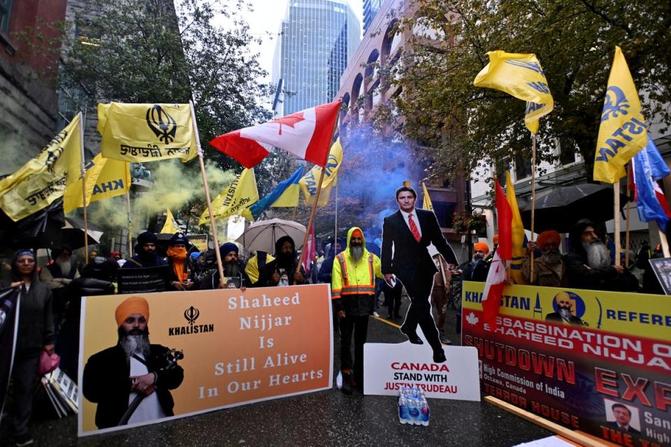 Flags and signs are seen as demonstrators protest outside India’s consulate, a week after Canada’s Prime Minister Justin Trudeau raised the prospect of New Delhi’s involvement in the murder of Sikh separatist leader Hardeep Singh Nijjar in 2023 (REUTERS)