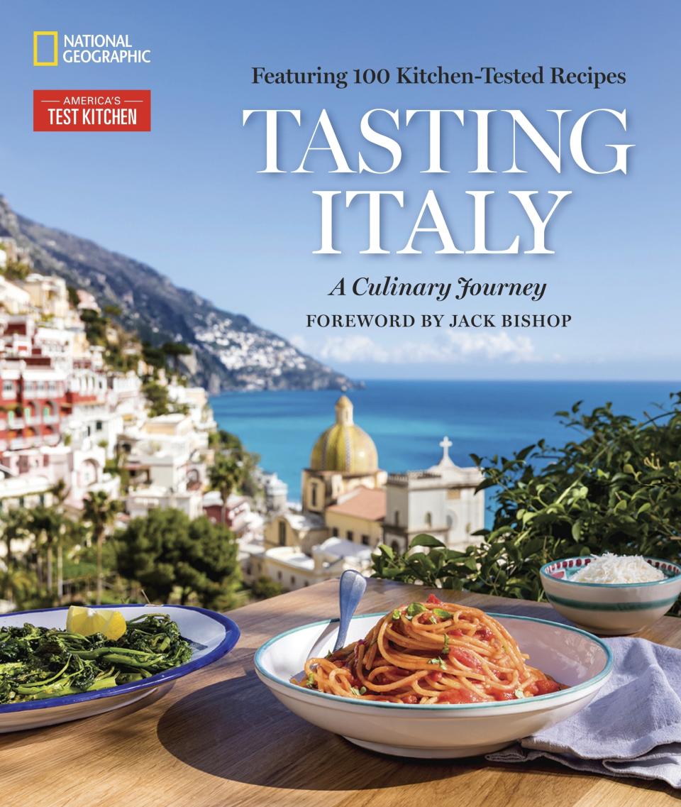 This image provided by America's Test Kitchen in January 2019 shows the cover for the cookbook "Tasting Italy." It includes a recipe for Tiramisu. (America's Test Kitchen via AP)