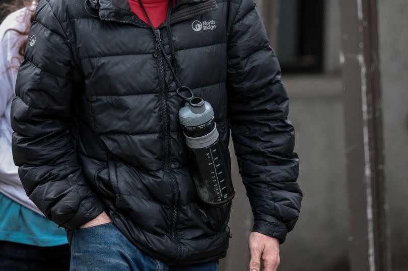 Adam Wood leaving Manchester Crown Court on an earlier occasion -Credit:Manchester Evening News