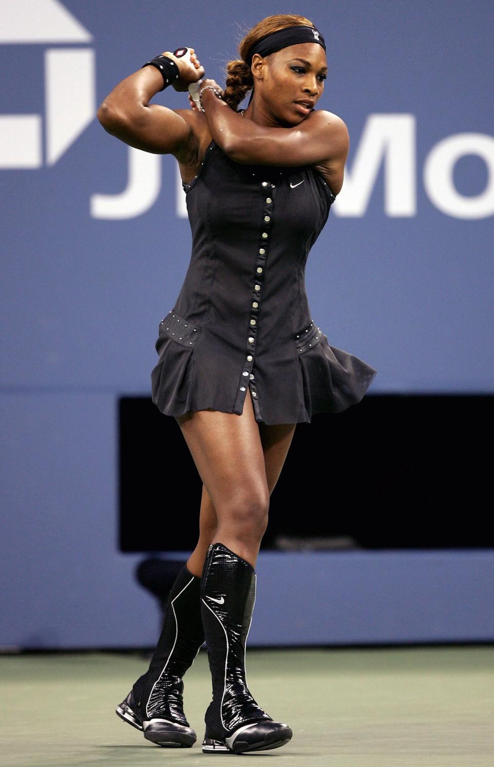 Serena Williams warms up prior to her match against Tatiana Golovin of France during the US Open at the USTA National Tennis Center in Flushing Meadows Corona Park on September 3, 2004 in the Flushing neighborhood of the Queens borough of New York