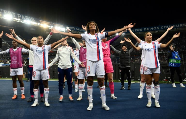 Captain Wendie Renard (C) and her Lyon teammates celebrate beating Paris Saint-Germain to reach the Women's Champions League final (AFP/FRANCK FIFE)