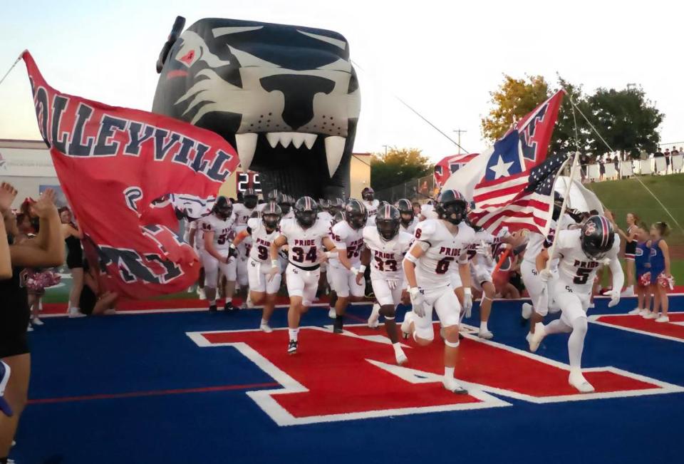 The Colleyville Heritage Panthers take the field before squaring off with Grapevine in the Battle of the Red Rail on Friday, September 29, 2023 at Mustang-Panther Stadium in Grapevine, Texas. Darren Lauber/Fort Worth Star-Telegram