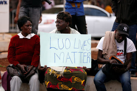 Supporters of Kenyan opposition leader Raila Odinga, from the National Super Alliance (NASA), coalition protest outside the Supreme Court in Nairobi, Kenya August 18, 2017. REUTERS/Baz Ratner