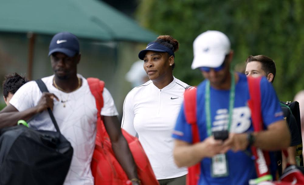 Serena Williams walks to the practice courts ahead of the 2022 Wimbledon Championships at the All England Lawn Tennis and Croquet Club, Wimbledon, england, Thursday June 23, 2022. (Steven Paston/PA via AP)