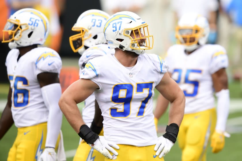 Los Angeles Chargers defensive end Joey Bosa (97) looks on during an NFL football game.