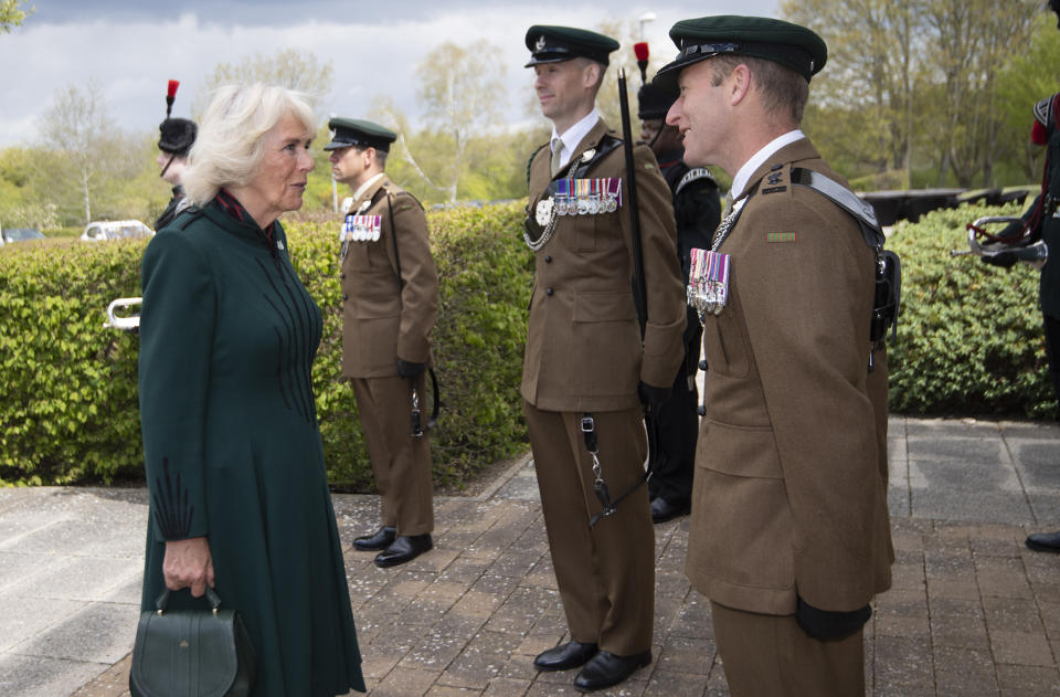 The Duchess of Cornwall meets Lieutenant Colonel Jim Hadfield MBE during her first visit to 5th Battalion The Rifles, following her new appointment as Colonel-in-Chief, at Bulford Station in Wiltshire. Picture date: Friday May 7, 2021.