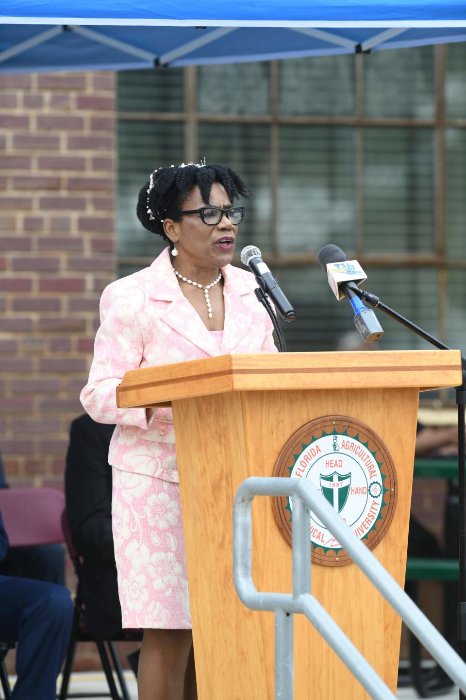 Margareth Larose-Pierre, director of FAMU's Durell Peaden Jr. Rural Pharmacy Education Campus in Crestview, speaks during a ceremony Wednesday marking the 10th anniversary of the campus in Crestview.