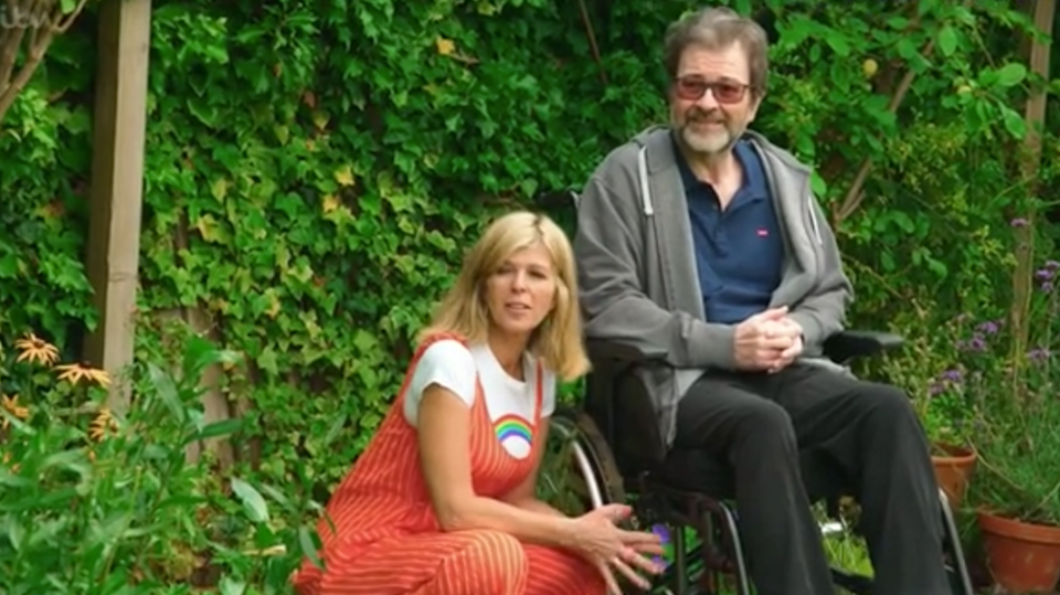 Kate Garraway and husband Derek Draper in their wellness garden. (ITV)