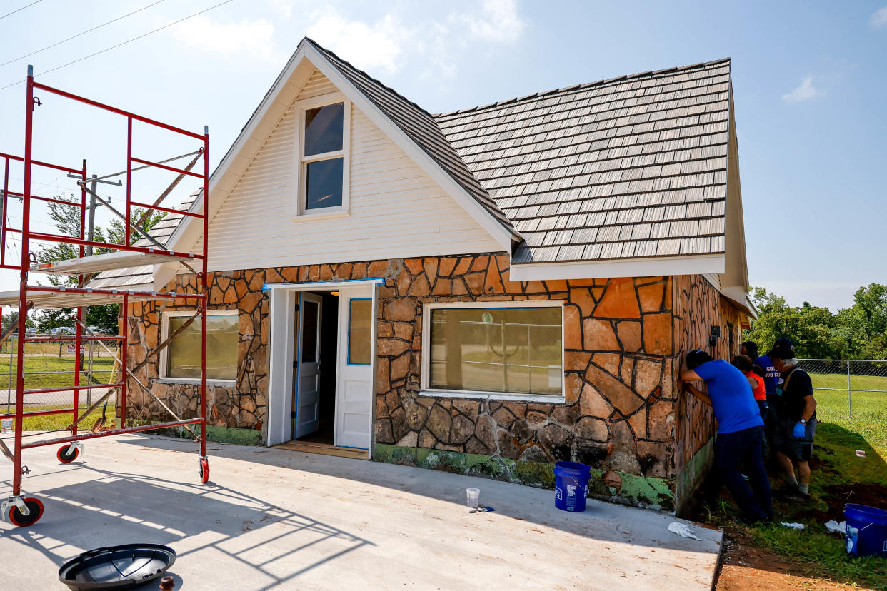 The historic Luther Filling Station is shown in this June 2023 photo during a restoration effort led by the National Trust for Historic Preservation's Hands On Preservation Experiences (HOPE) team.