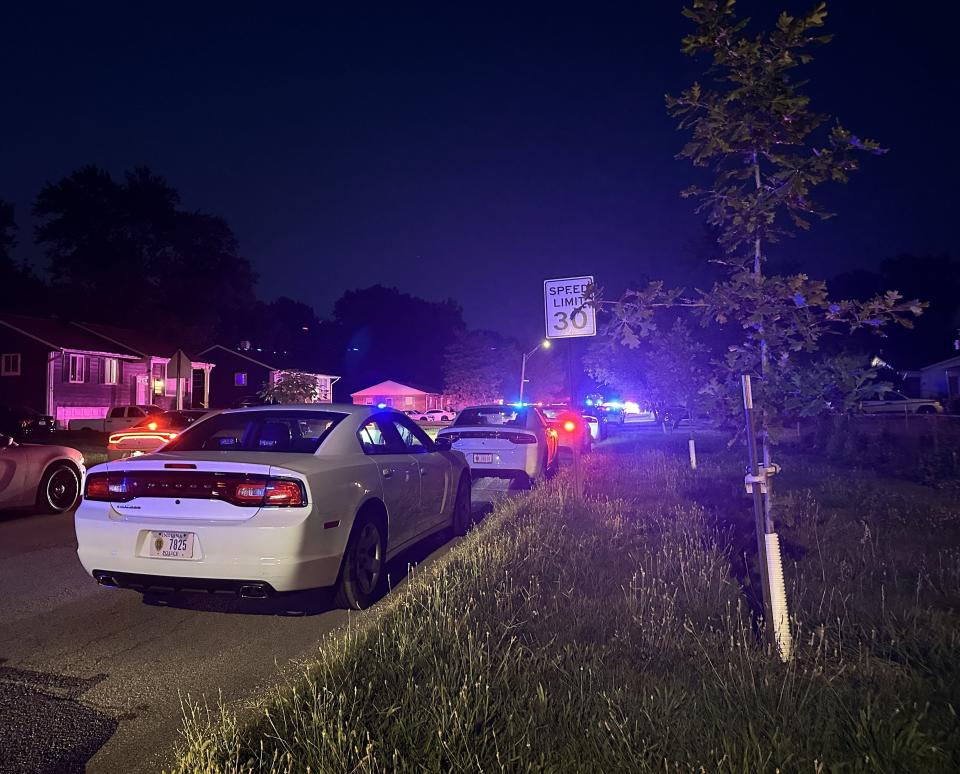 Indianapolis Metropolitan Police Department vehicle lines the roadway after an officer was shot in the 3600 block of Wittfield Street on the city's far east side. The officer was listed in stable condition shortly after the shooting July 26, 2024.