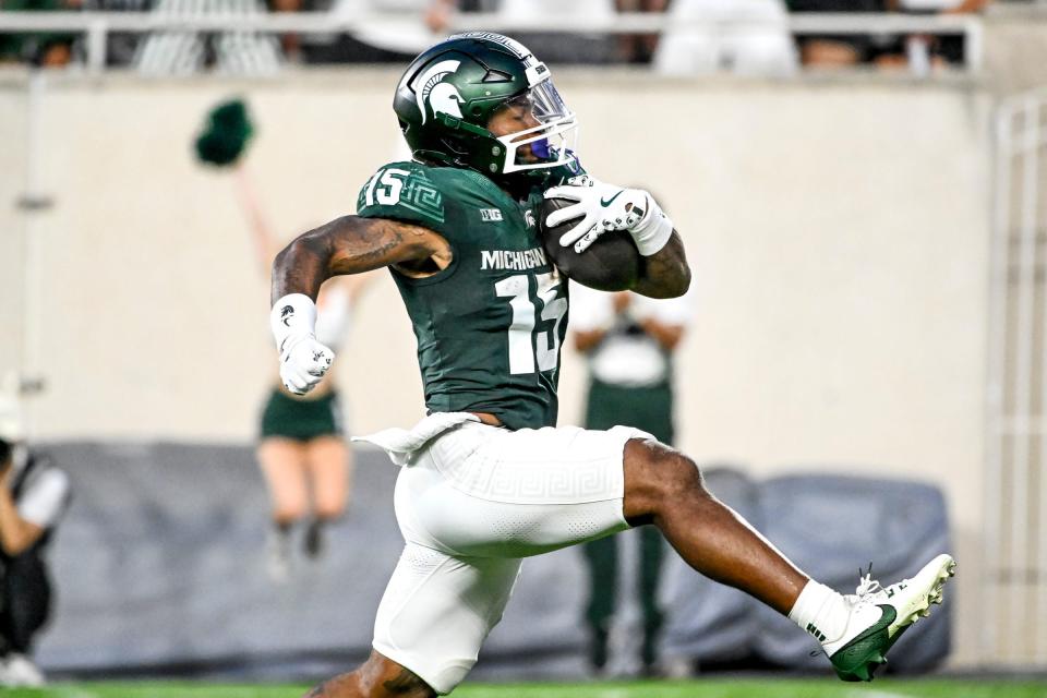 Michigan State's Kay'ron Lynch-Adams runs for a touchdown against Florida Atlantic during the second quarter on Friday, Aug. 30, 2024, at Spartan Stadium in East Lansing.