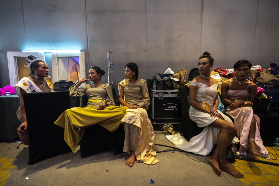 Contestants who were not selected for the final round sit back stage during Miss Trans Northeast 22, beauty pageant in Guwahati, India, Wednesday, Nov. 30, 2022. In a celebration of gender diversity and creative expression, a beauty pageant in eastern Indian state of Assam brought dozens of transgender models on stage in Guwahati. Sexual minorities across India have gained a degree of acceptance especially in big cities and transgender people were given equal rights as a third gender in 2014. But prejudice against them persists and the community continues to face discrimination and rejection by their families. (AP Photo/Anupam Nath)