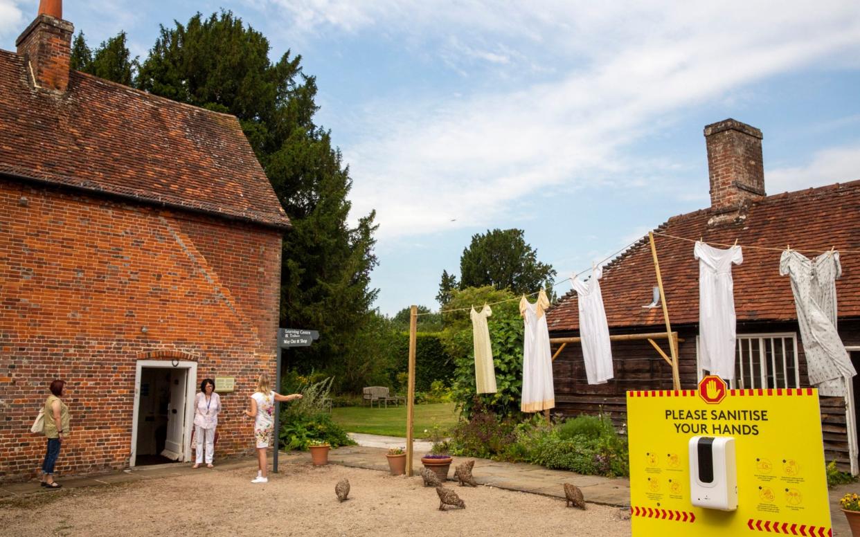 Period dresses hang on a washing line at the re-opened Jane Austen's House, in Chawton, Hampshire - Heathcliff O'Malley