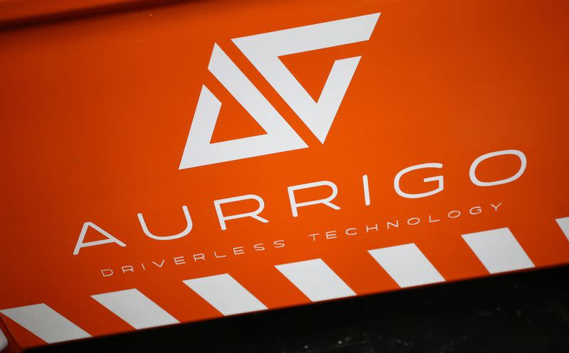 A company logo is seen on the side od an autonomous vehicle at the Aurrigo factory in Coventry