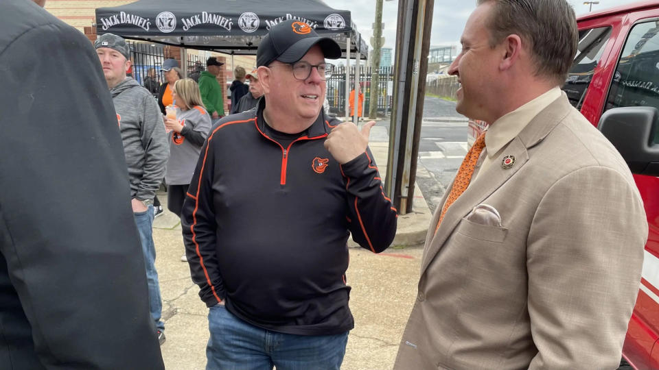 Former Maryland Gov. Larry Hogan, a Republican candidate for the Senate, greets Baltimore Orioles fans, including a large contingent of first responders, at a former firehouse turned pub blocks from Camden Yards, just ahead of the major league baseball team's home opener, on March 28.