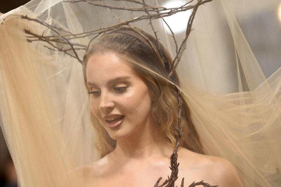 Lana with twig headpiece and sheer veil, earthy, nature-inspired style