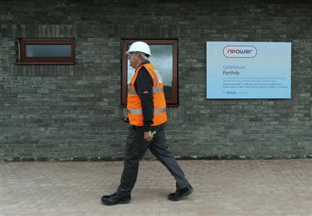 A worker walks at energy company RWE npower's new gas-fired Pembroke Power Station, in Pembroke, Wales September 19, 2012. REUTERS/Rebecca Naden