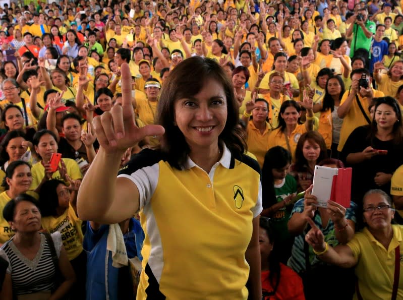 FILE PHOTO - Philippine Vice-presidential candidate and congresswoman Leni Robredo flashes a Laban (Fight) sign during her campaign rally in Quezon City, Metro Manila