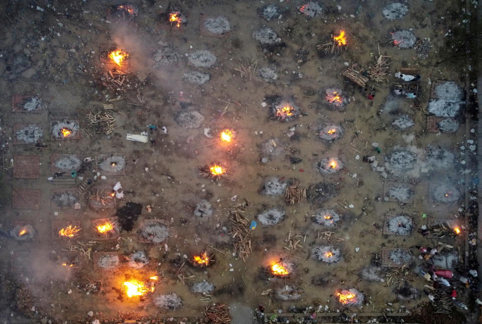 A mass cremation of victims who died due to the Covid outbreak from above  New  Delhi. 