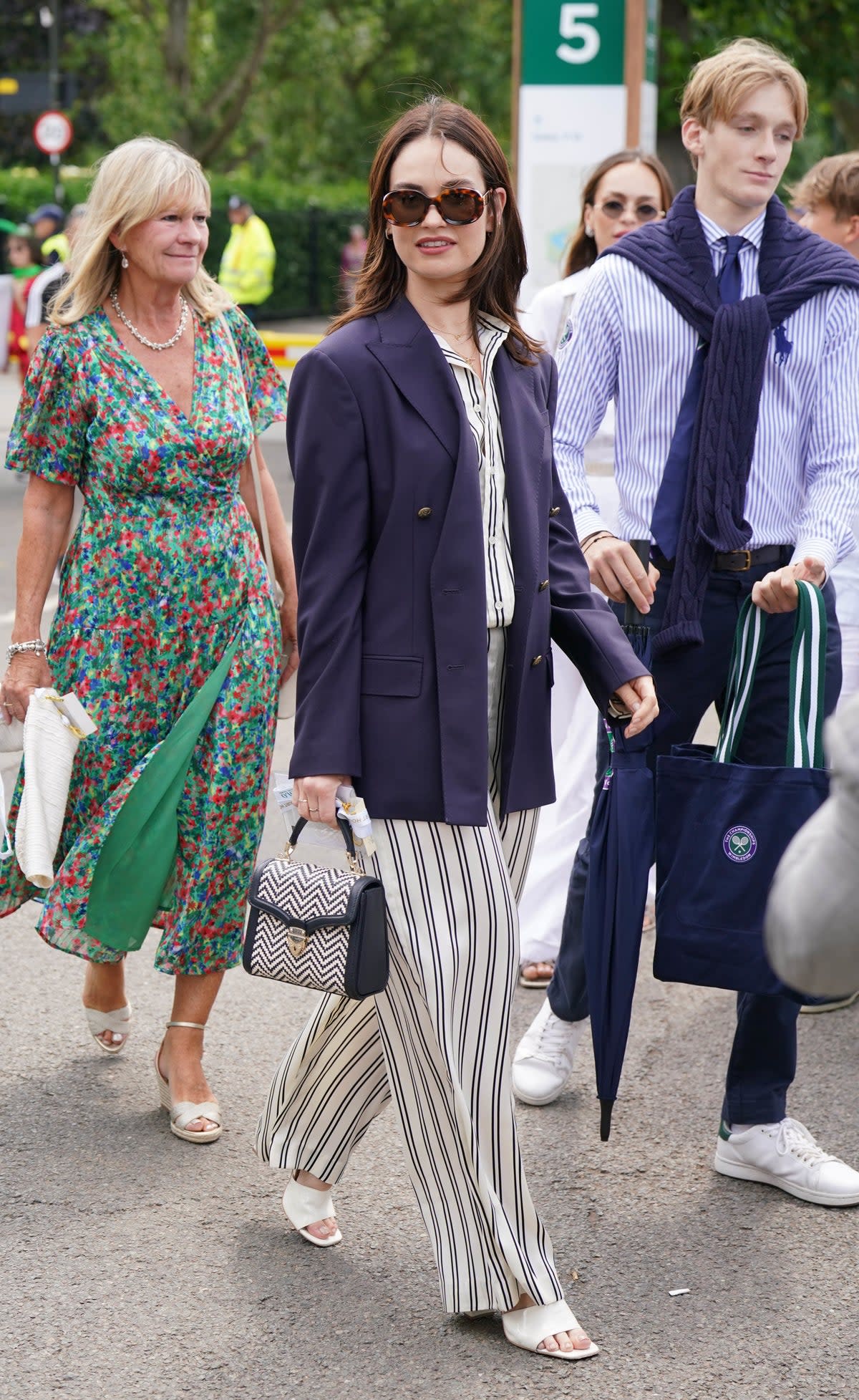 Lily James arriving at Wimbledon day 14 (PA)