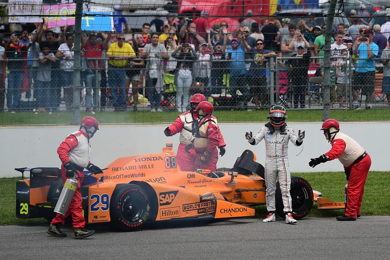 Fernando Alonso’s car came to a stop inside turn 1. (Getty)