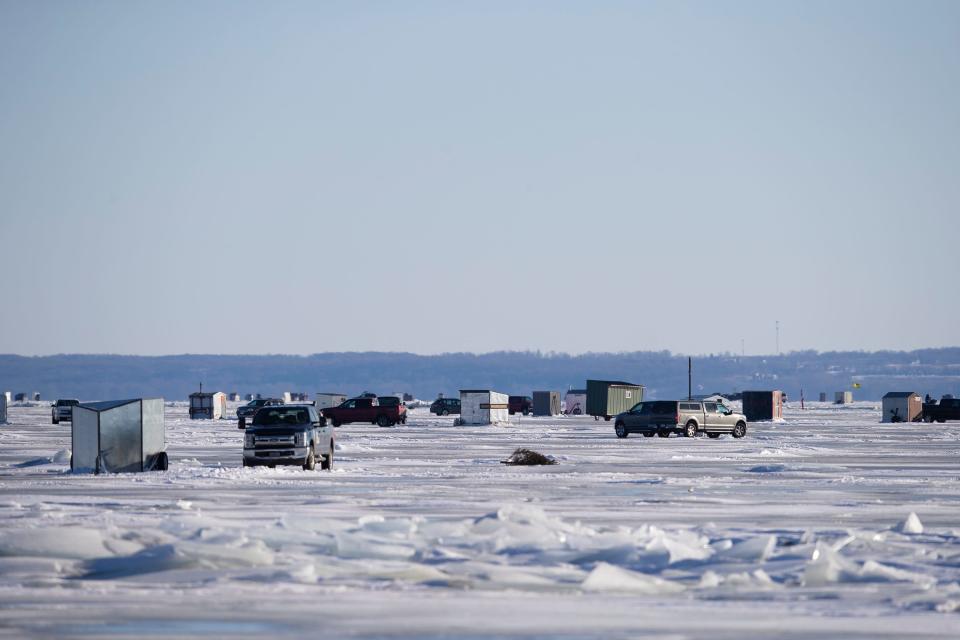 Ice shanties scattered across Lake Winnebago on the opening day of sturgeon spearing, Saturday, Feb. 12, 2022, in Oshkosh, Wis. Samantha Madar/USA TODAY NETWORK-Wisconsin 