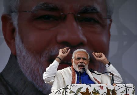 Prime Minister Narendra Modi addresses a rally in a cricket stadium in Srinagar, November 7, 2015. REUTERS/Danish Ismail