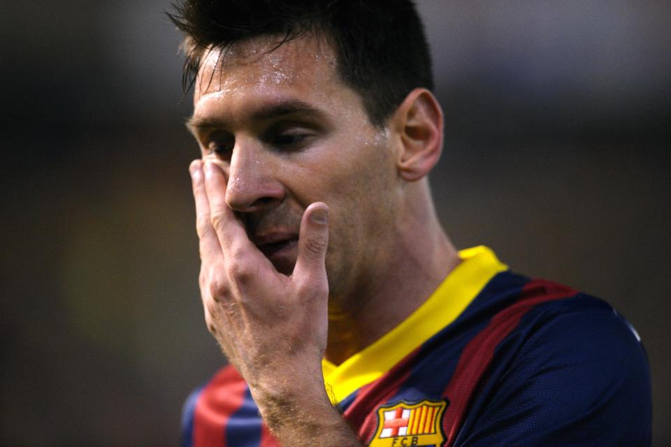 Barcelona's Lionel Messi reacts during the final of the Copa del Rey between FC Barcelona and Real Madrid at the Mestalla stadium in Valencia, Spain, Wednesday, April 16, 2014. (AP Photo/Manu Fernandez)