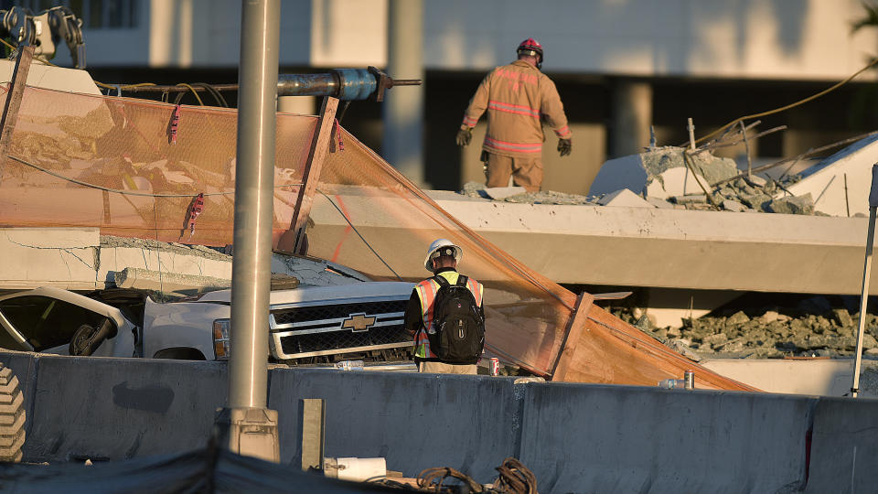 <em>Search – emergency services are searching for remaining survivors but have admitted the likelihood of finding anyone is low (Pictures: PA)</em>