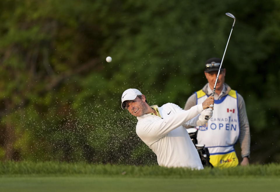 Rory McIlroy blasts out of the bunker on the 11th hole during the Canadian Open Pro-Am in Toronto on Wednesday, June 7, 2023. (Nathan Denette/The Canadian Press via AP)