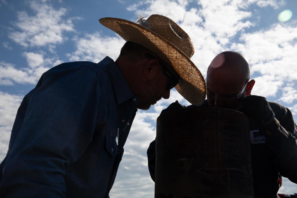 From left, Matt Richard, of Blue Diamond Welding, and Tearle White, of Acuren, judge a partner weld during a competition at Del Mar College on Friday, Nov. 3, 2023.