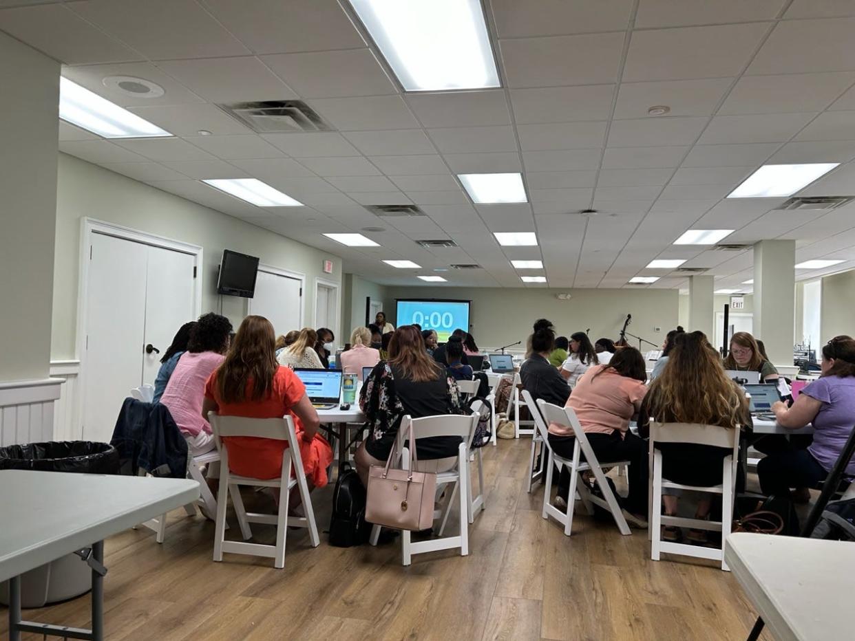 Local educators listen as Savannah Music Festival Musical Explorer Manager, Heike Currie, leads a collaborative session