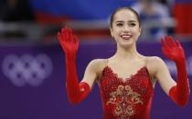 Figure Skating - Pyeongchang 2018 Winter Olympics - Women Single Skating free skating competition final - Gangneung Ice Arena - Gangneung, South Korea - February 23, 2018 - Gold medallist Alina Zagitova, an Olympic Athlete from Russia, waves. REUTERS/Damir Sagolj