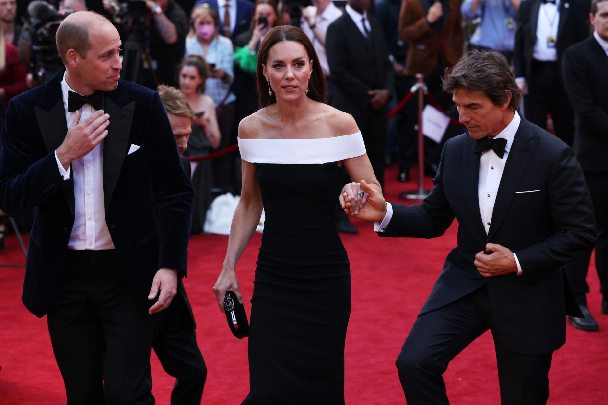 LONDON, ENGLAND - MAY 19: Prince William, Duke of Cambridge and Catherine, Duchess of Cambridge are accompanied by star actor Tom Cruise as they arrive for the 