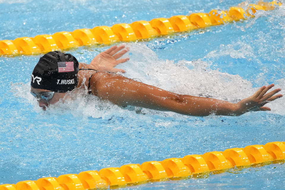 Torri Huske, of the United States, swims during a semifinal in the women's 100-meter butterfly at the 2020 Summer Olympics, Sunday, July 25, 2021, in Tokyo, Japan. (AP Photo/Petr David Josek)