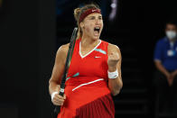 Aryna Sabalenka of Belarus reacts after winning the second set against Storm Sanders of Australia during their first round match at the Australian Open tennis championships in Melbourne, Australia, Tuesday, Jan. 18, 2022. (AP Photo/Hamish Blair)