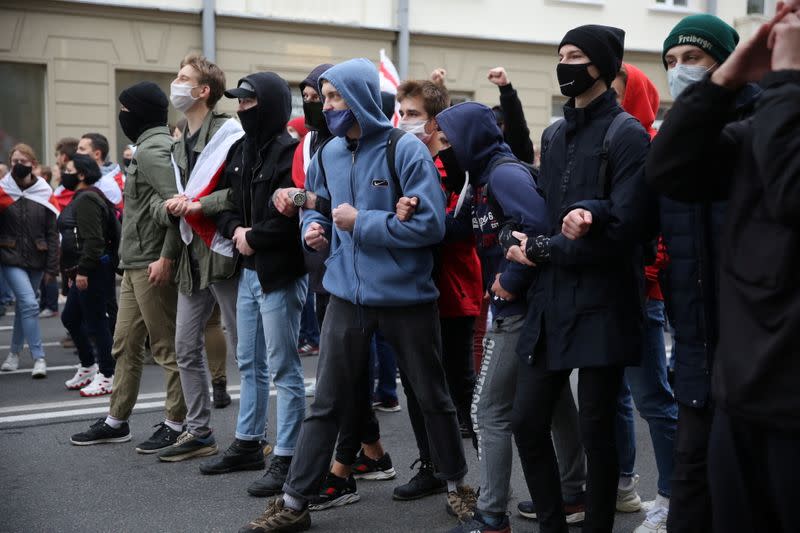 Belarusian opposition supporters hold a rally in Minsk