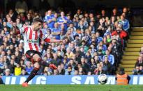 Sunderland's striker Fabio Borini scores his team's second goal from a penalty during anEnglish Premier League football match against Chelsea at Stamford Bridge in London on April 19, 2014