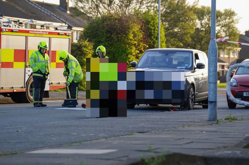 The damaged vehicles at the scene