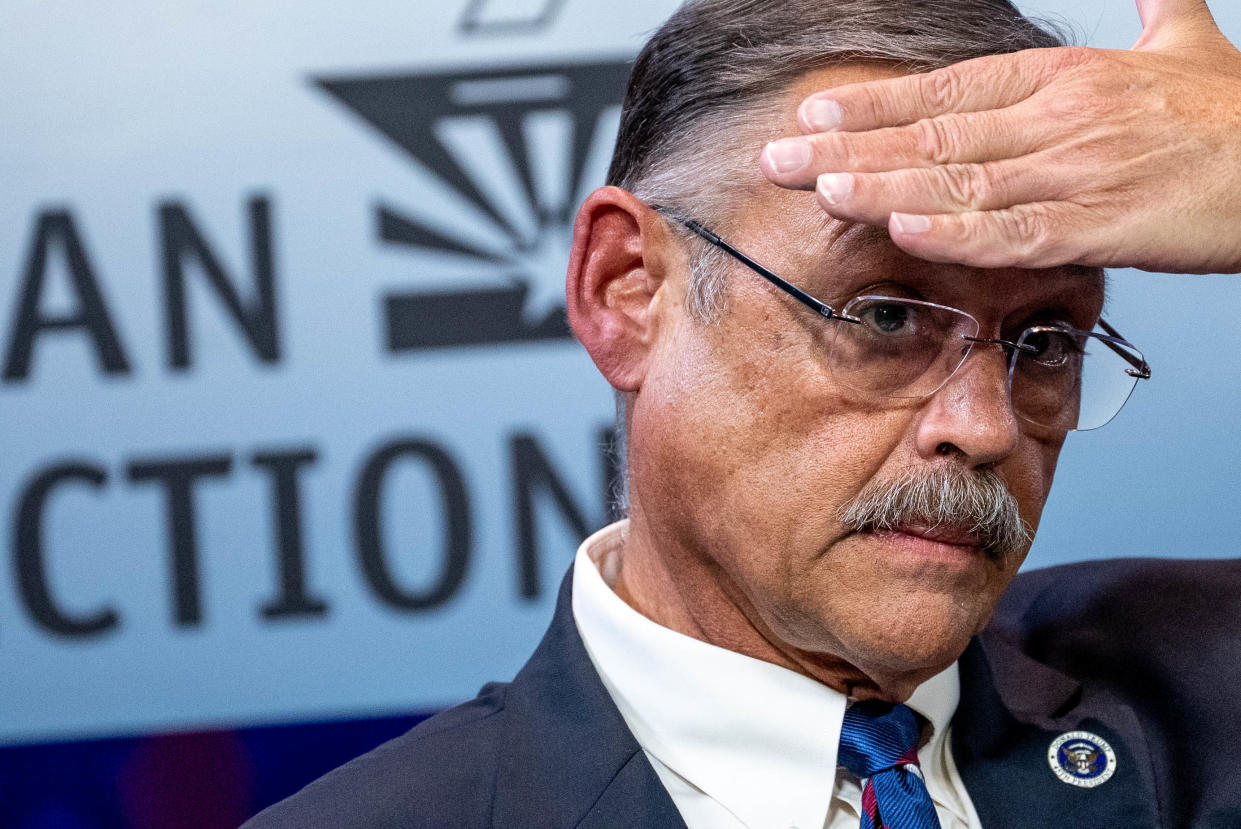 Mark Finchem, Republican candidate for secretary of state, attends a debate sponsored by the Arizona Clean Elections Commission at the Arizona PBS studios at the Walter Cronkite School of Journalism and Mass Communication at Arizona State University in Phoenix on Sept. 22, 2022.